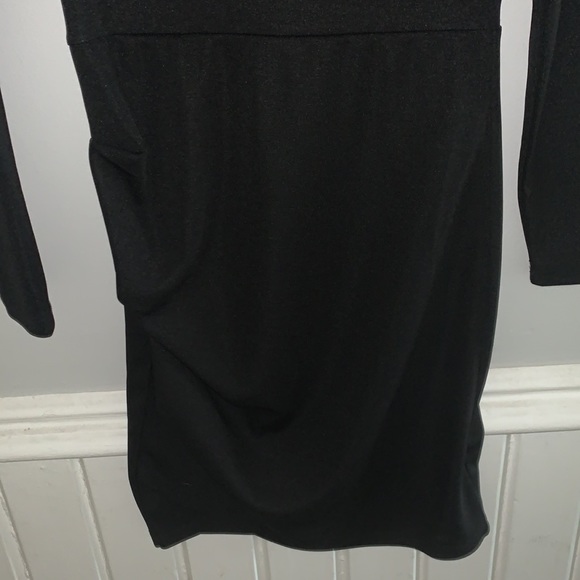 A black tight dress. - Picture 3 of 3